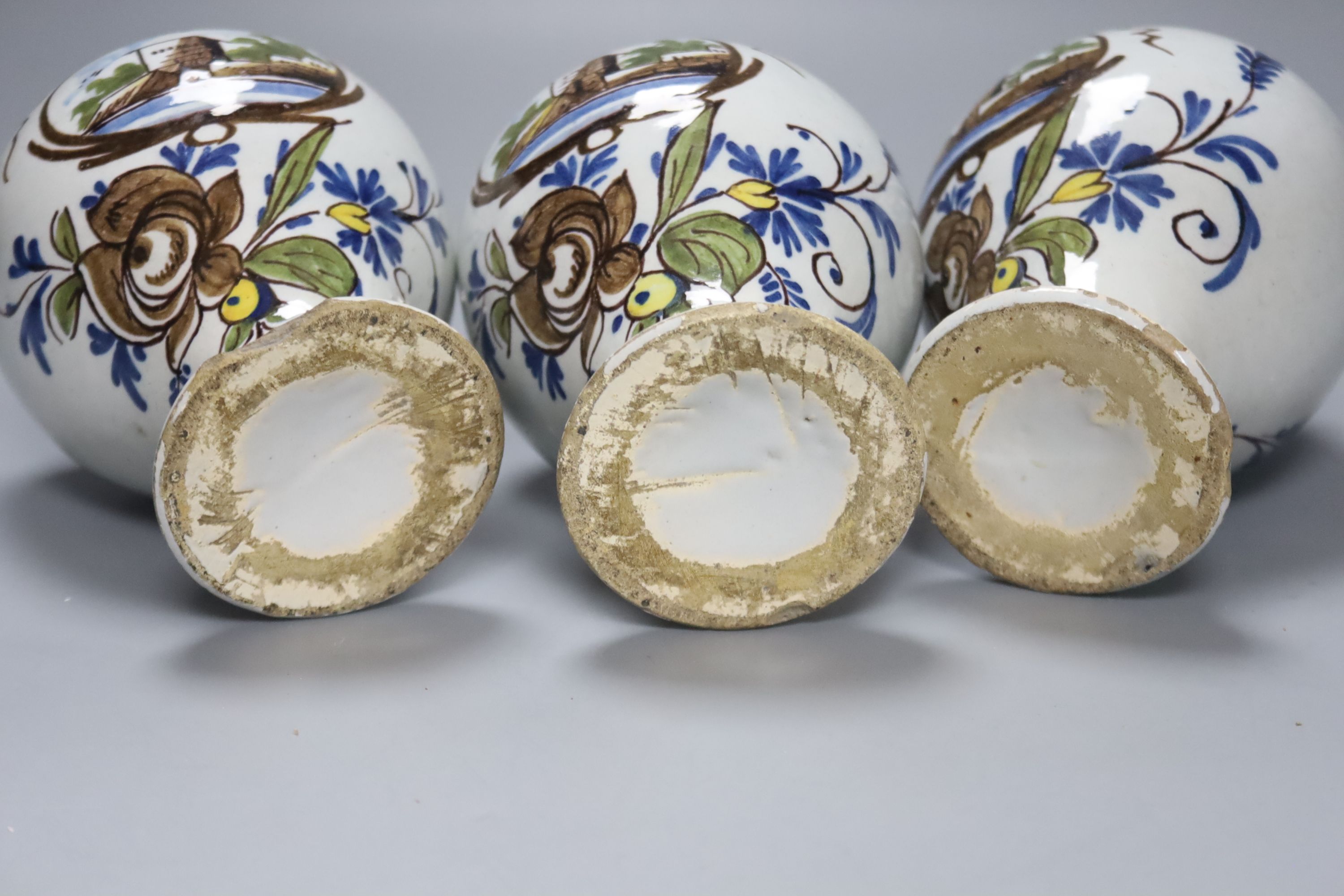 A set of three Dutch Delft baluster jars, first half 18th century, height 14cm